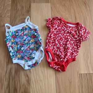 2 floral onesies